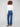 Designed with back pockets, these indigo flare jeans combine functionality with fashion-forward elements by Charlie B.