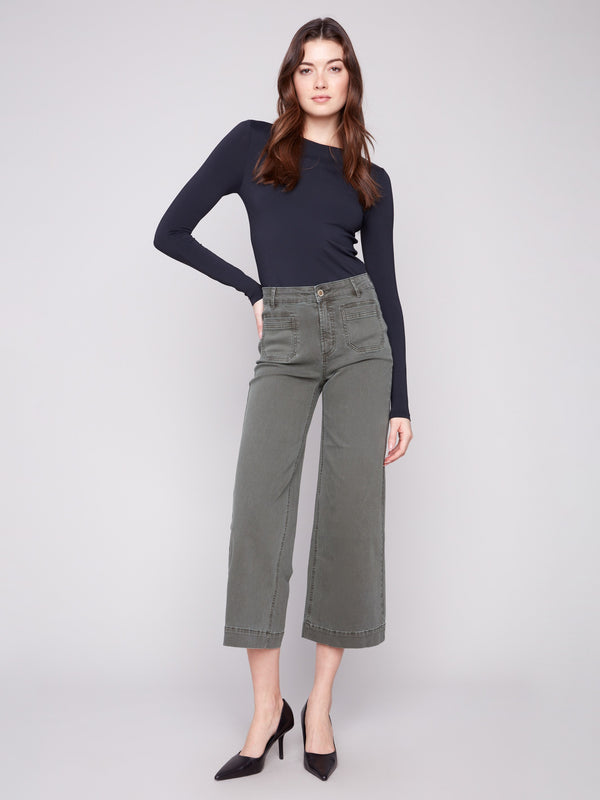 Spruce-colored cropped pants featuring a flare fit and crafted from stretch twill fabric for comfort by Charlie B.