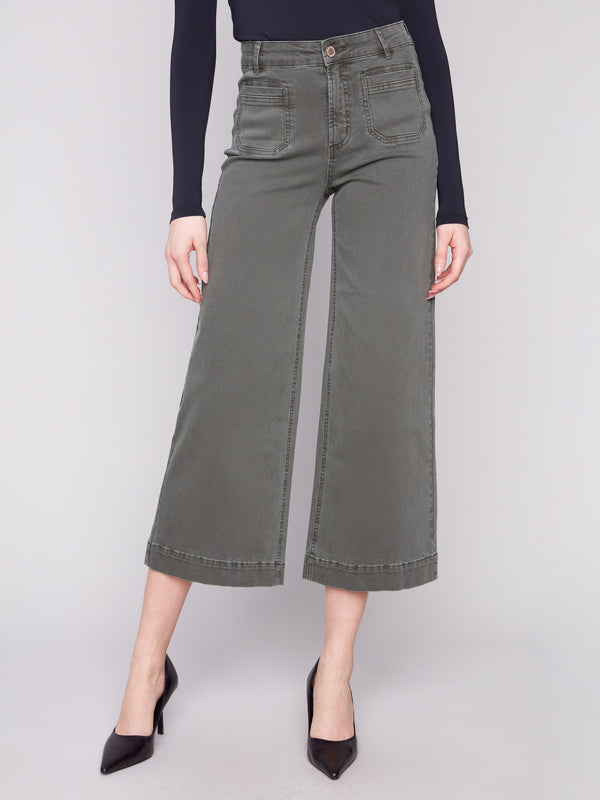 Spruce-colored cropped pants with front patch pockets, offering a stylish and functional design by Charlie B.