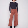 Sepia-colored twill pants featuring a comfortable flare fit and stylish design by Charlie B.