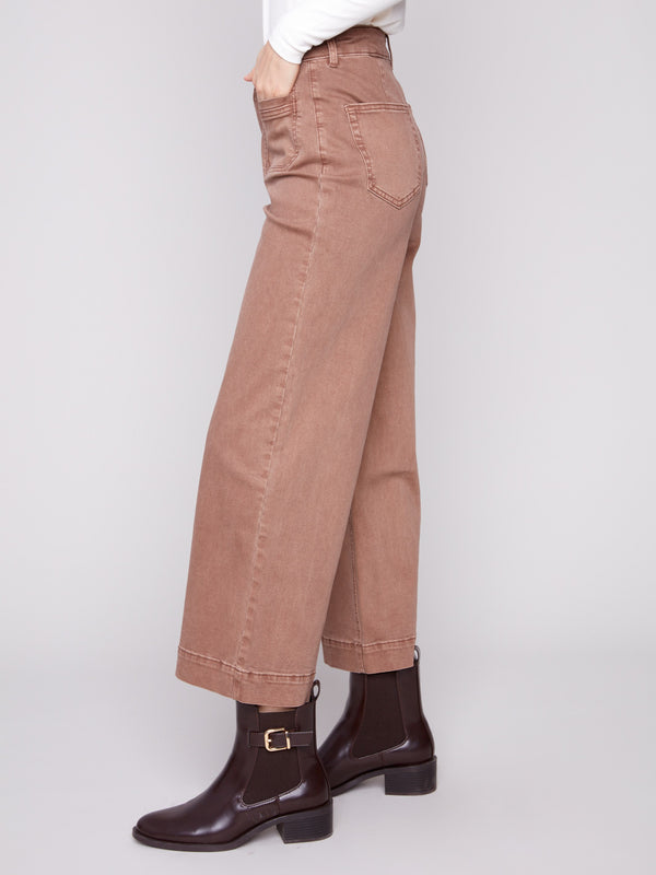 Enjoy the flattering flare fit of these truffle-colored cropped pants, complete with back pockets by Charlie B.