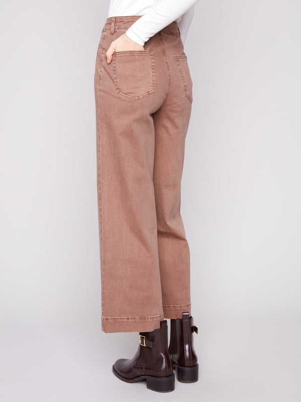 Crafted in stretch twill fabric, these cropped flare pants offer both style and comfort by Charlie B.