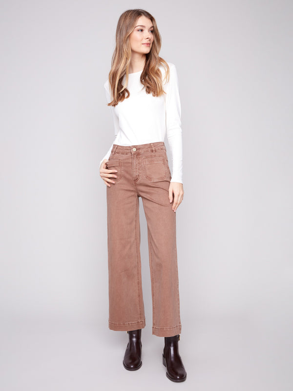 Truffle-colored cropped pants designed with a regular rise and stylish patch pockets for a chic look by Charlie B.