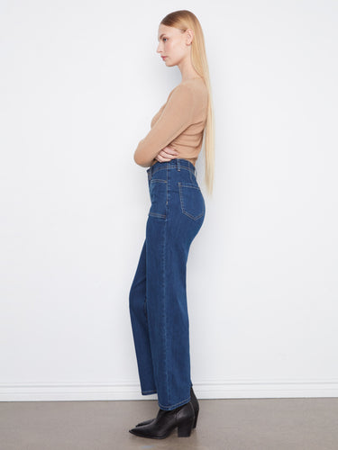 Jeans featuring practical patch pockets for added utility by Charlie B.