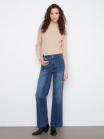 These jeans feature a stylish wide leg design, perfect for a modern look. Crafted with attention to detail by Charlie B.