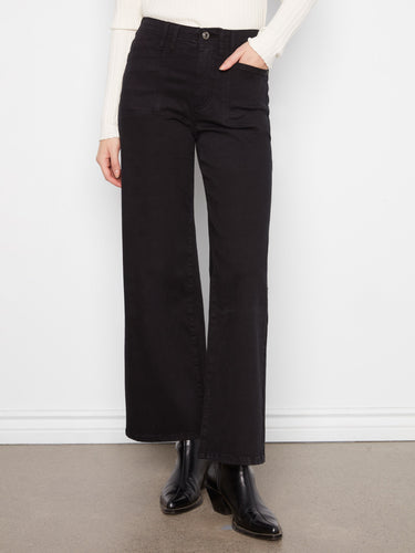 Comfortable stretch twill fabric in these black wide-leg pants, matched with stylish boots by Charlie B.