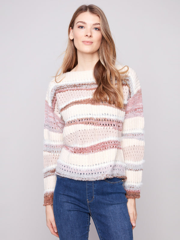 Knit sweater featuring a stylish crew neckline and striped design for a modern look by Charlie B.