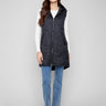 Black long vest with quilted texture and a sleek zipper front closure by Charlie B.
