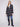 Navy plaid boucle coat featuring a tailored collar and elegant design by Charlie B.