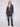Stay warm and stylish in this navy plaid boucle coat that combines modern design with classic elements. By Charlie B.