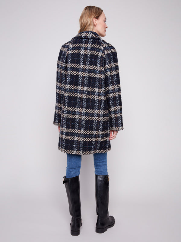 Chic navy plaid boucle coat designed to elevate your wardrobe with its sophisticated pattern and finish. By Charlie B.