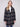 Versatile and fashionable, this navy plaid boucle coat is perfect for layering over any ensemble effortlessly. By Charlie B.