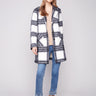 Chic black and white plaid boucle knit coat with tailored collar, adding a touch of sophistication to any outfit by Charlie B.