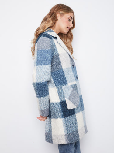 Designed with convenient patch pockets, this coat combines style and practicality by Charlie B.