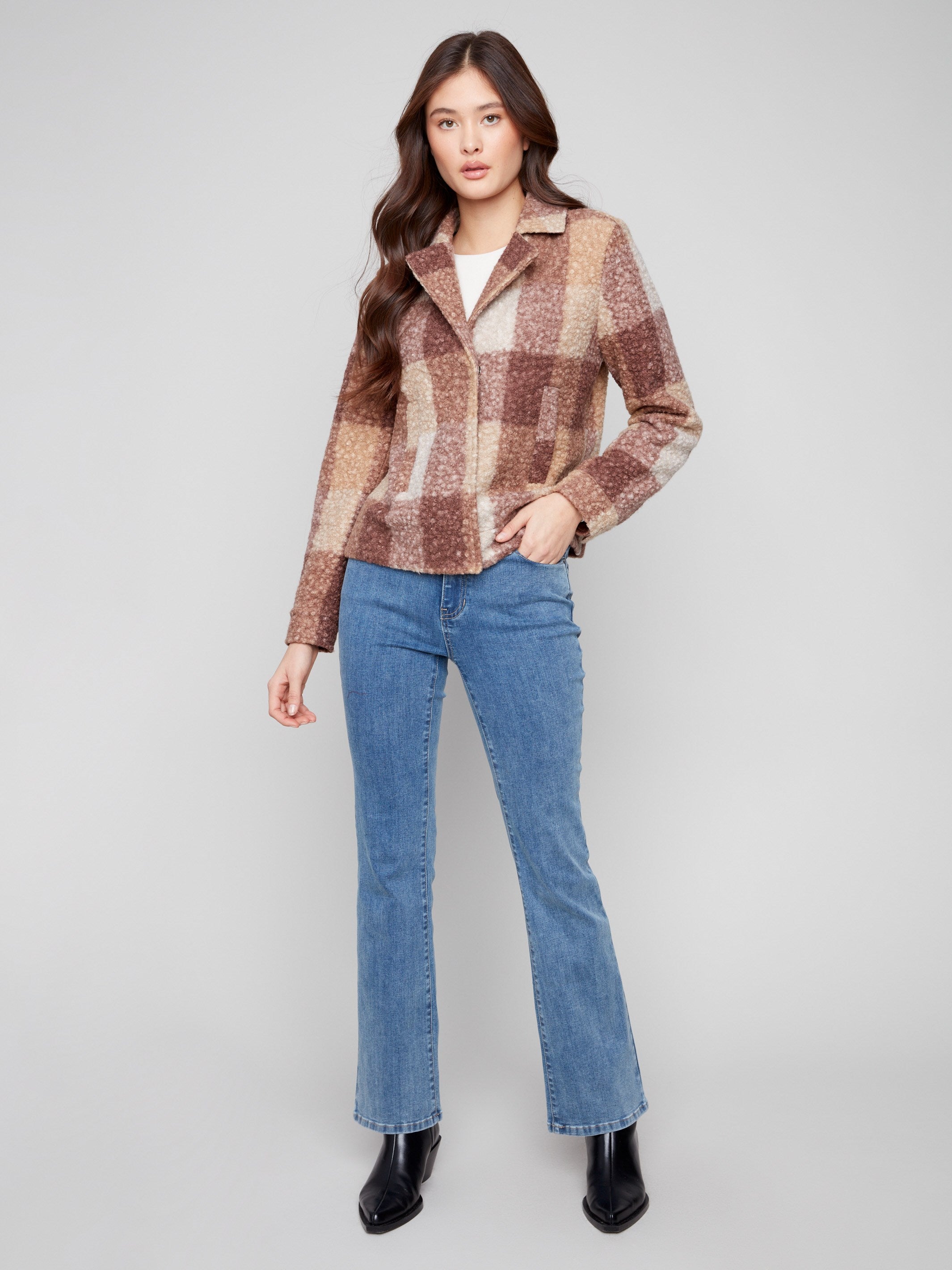 Plaid short coat with welt pockets for added functionality and fashion-forward style by Charlie B.