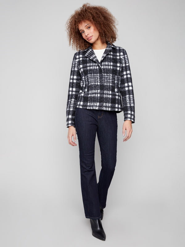 Chic short coat with a notch lapel collar in a plaid boucle knit fabric, ideal for layering by Charlie B.