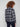 Elegant boucle knit coat with hidden snaps closure, adding subtle sophistication to your outfit by Charlie B.