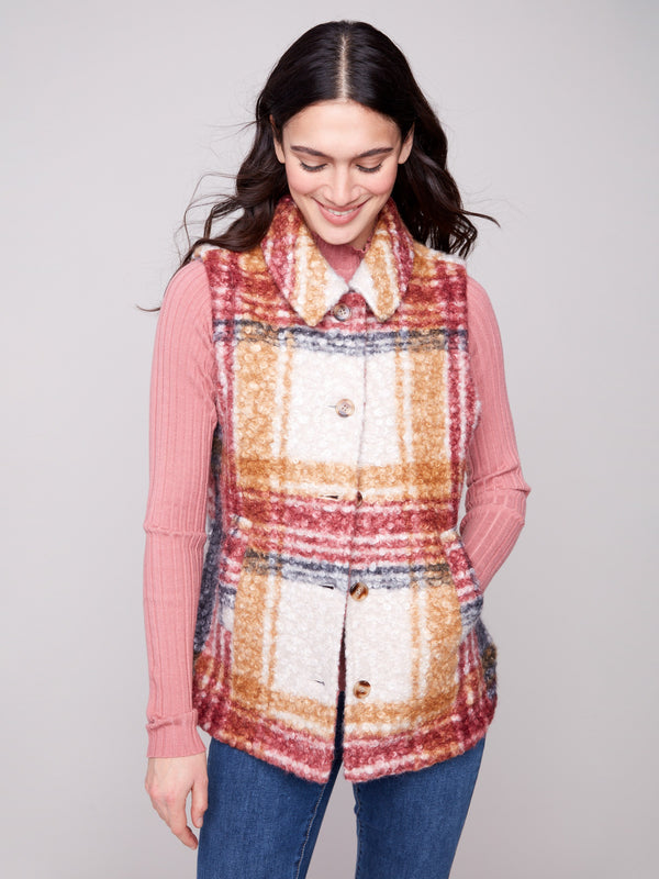 This vest features a plaid design in cabernet with welt pockets, perfect for stylish layering by Charlie B.