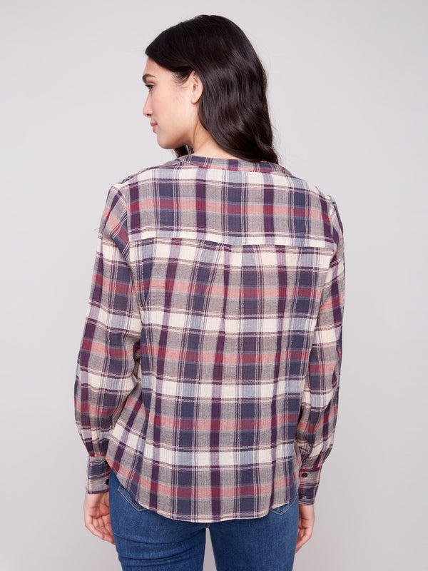 Cotton-blend fabric in a classic plaid pattern, ideal for layering in cooler weather by Charlie B.
