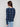 Elegant blue plaid top showcasing the unique front knot detail for added flair by Charlie B.