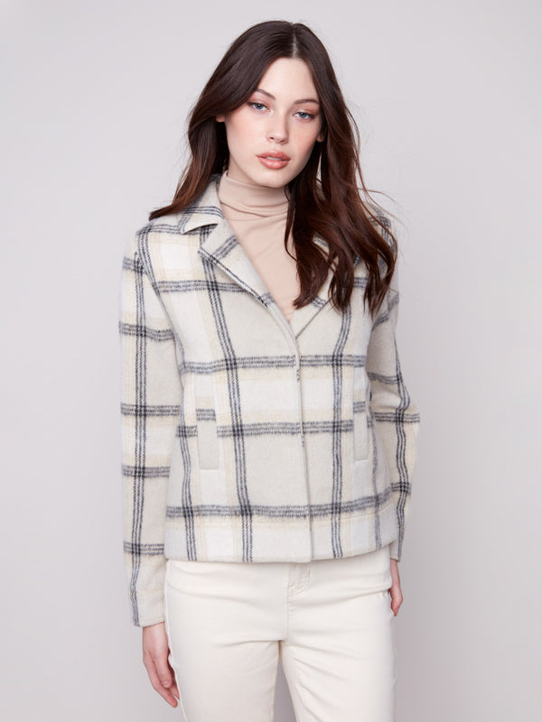 Elegant beige plaid short coat showcasing a tailored collar and refined detailing, complete with long sleeves by Charlie B.
