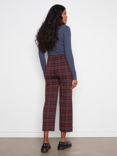 The pants include practical patch pockets, combining functionality with fashionable flair. By Charlie B.