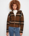 This stylish jacket features a classic Johnny collar, adding an elegant touch to your wardrobe. Designed by Charlie B.