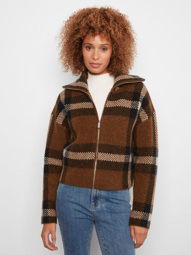 This stylish jacket features a classic Johnny collar, adding an elegant touch to your wardrobe. Designed by Charlie B.