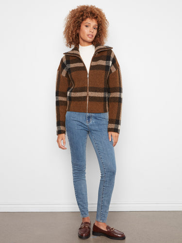The zip-up closure on this chic jacket offers both practicality and style for any casual outing. By Charlie B.