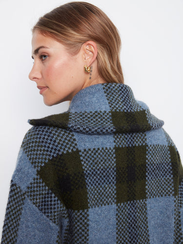 The classic Johnny collar adds an elegant touch to this versatile plaid jacket, ideal for layering by Charlie B.
