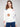 Ecru plush sweater with a cozy crew neckline adorned with colorful flower patterns by Charlie B.