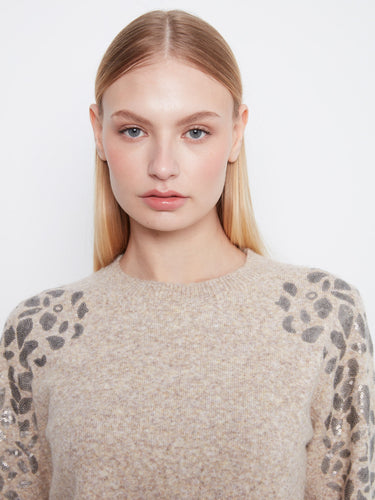 Elegant sequin detail on the shoulders adds a touch of sparkle to this stylish sweater, enhancing its chic appeal by Charlie B.