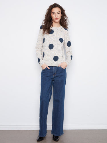 Chic white sweater with contrasting navy polka dots and long sleeves by Charlie B.