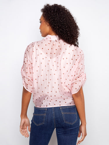 Embrace the lightweight feel of this semi-sheer fabric in a delightful polka dot design. Effortless style by Charlie B.