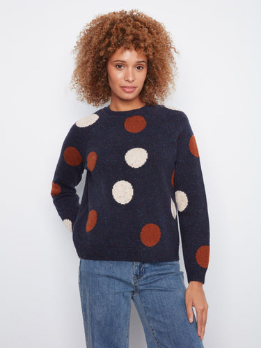 Navy sweater with crew neckline and playful oversized polka dots, perfect for a cozy day out by Charlie B.