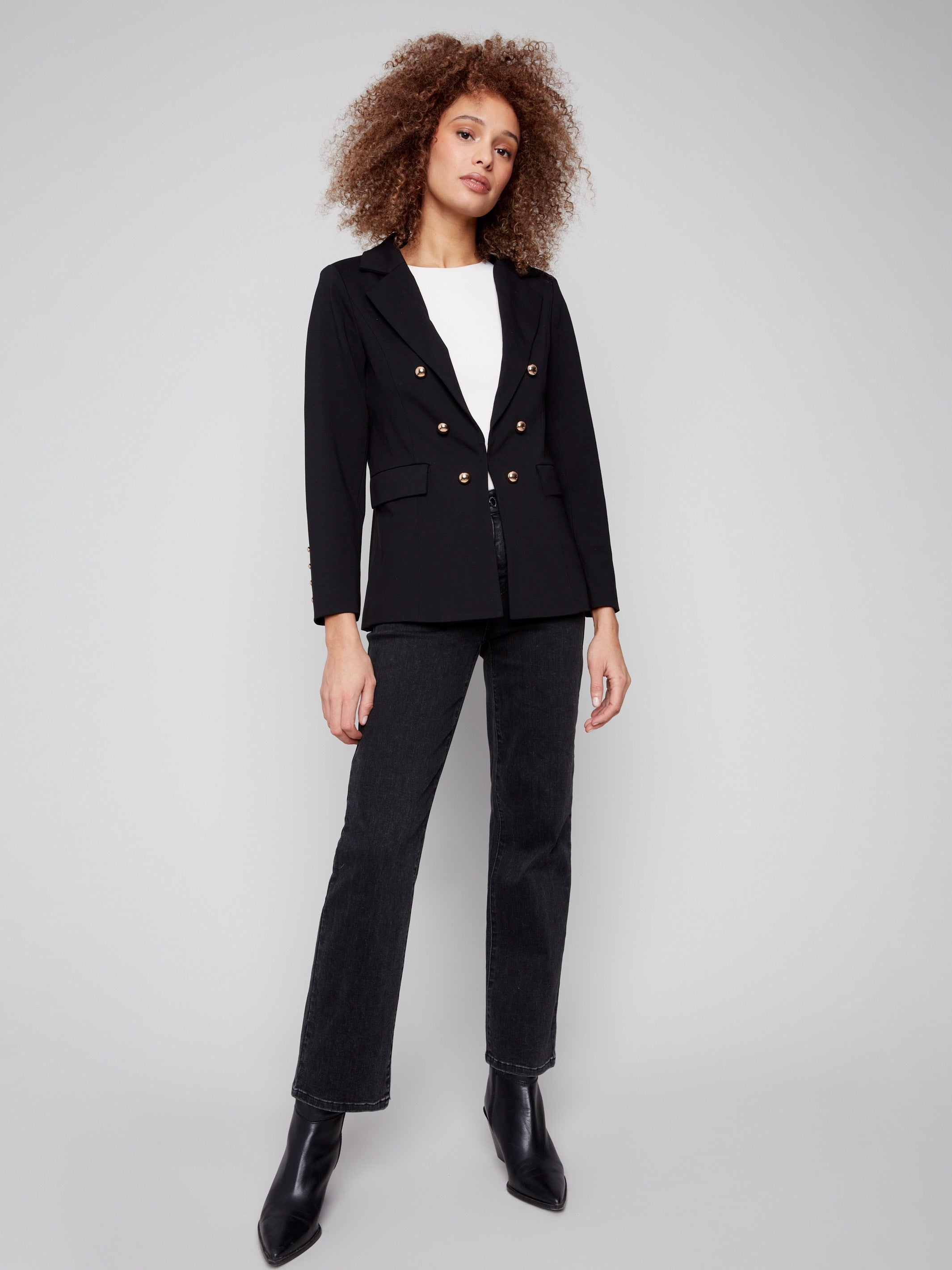 Sleek black blazer adorned with striking gold button details, perfect for elevating any outfit by Charlie B.