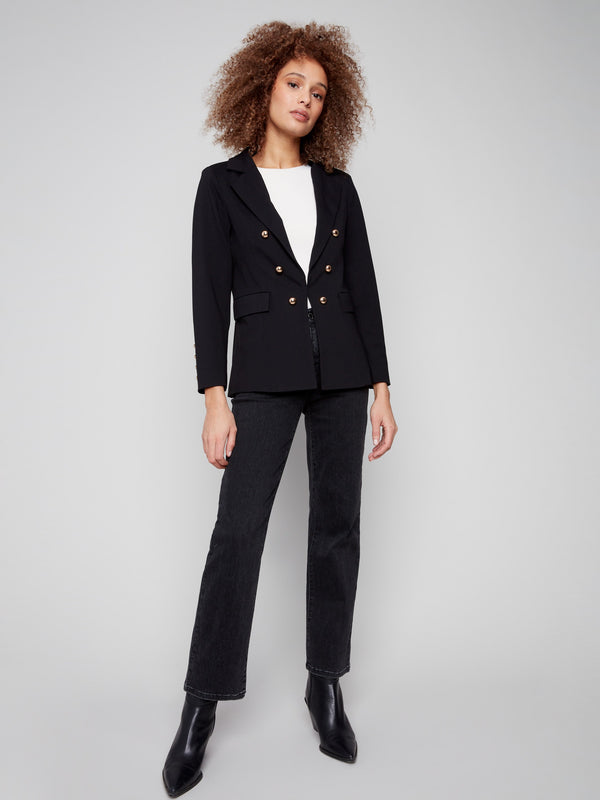 Sleek black blazer adorned with striking gold button details, perfect for elevating any outfit by Charlie B.
