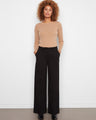 These pants feature a wide leg design, offering a stylish and comfortable fit for any occasion. By Charlie B.