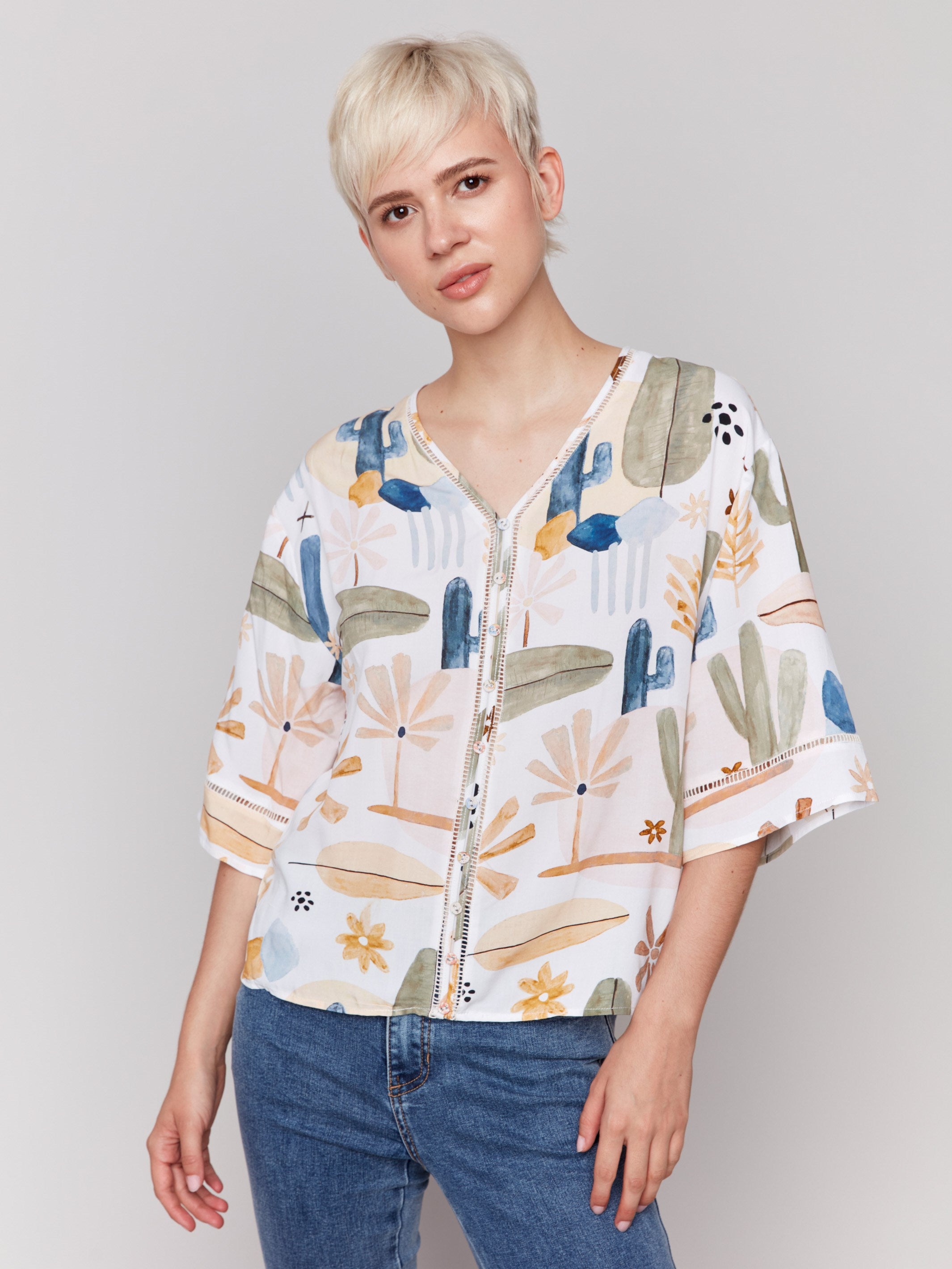 V-neck blouse with decorative buttons by Charlie B.