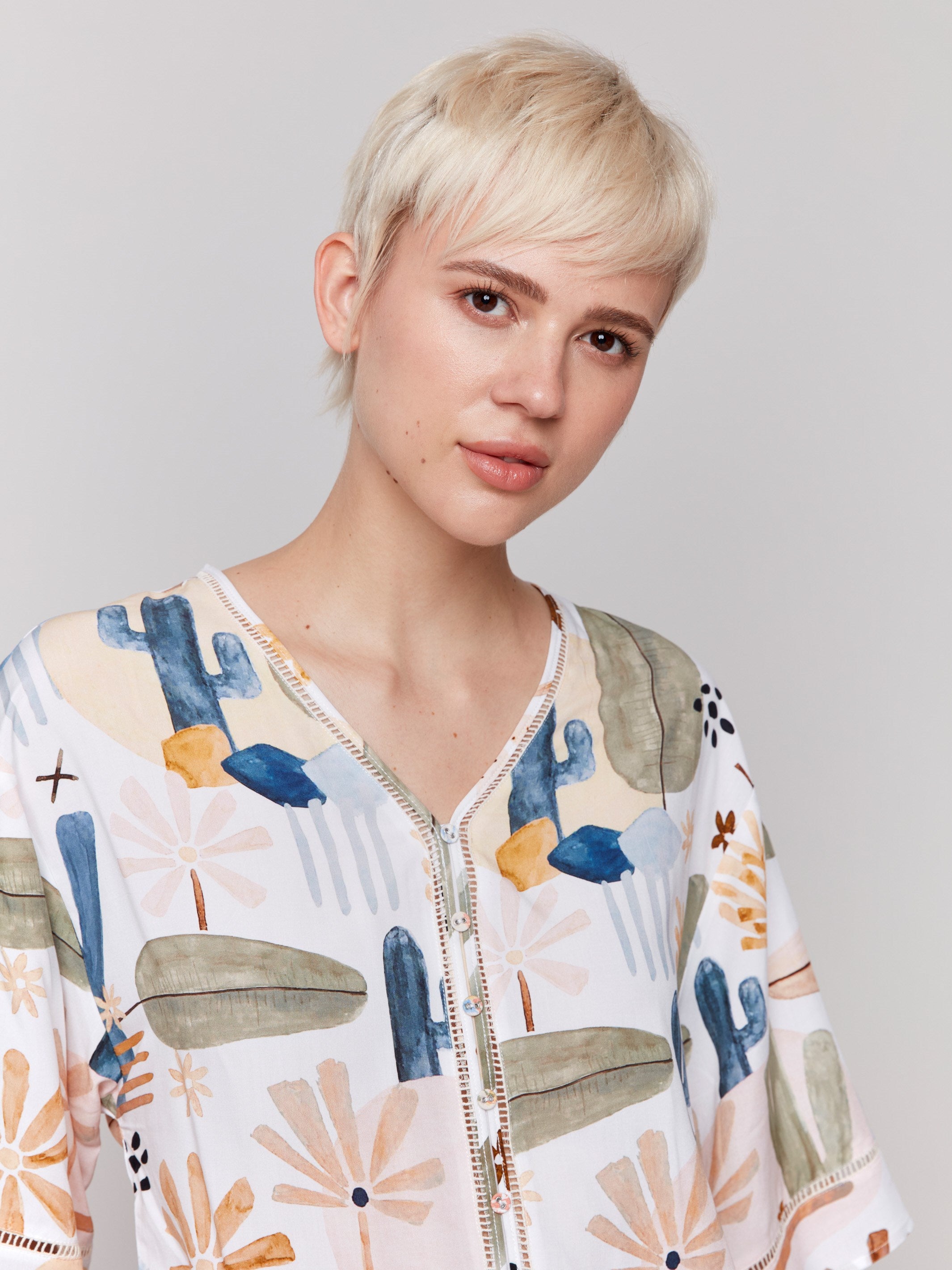 Blouse featuring wide 3/4 sleeves by Charlie B.