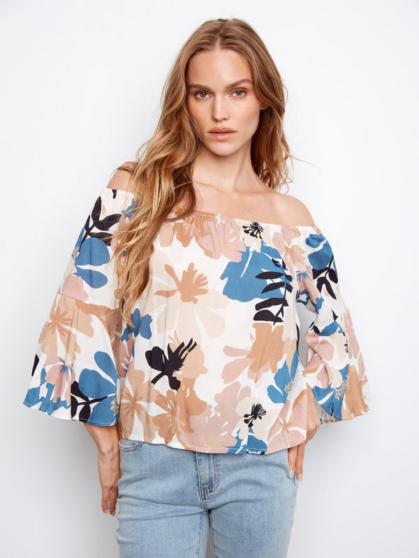 Chic off-the-shoulder top with a floral pattern, featuring elegant 3/4 sleeves for a stylish look by Charlie B.