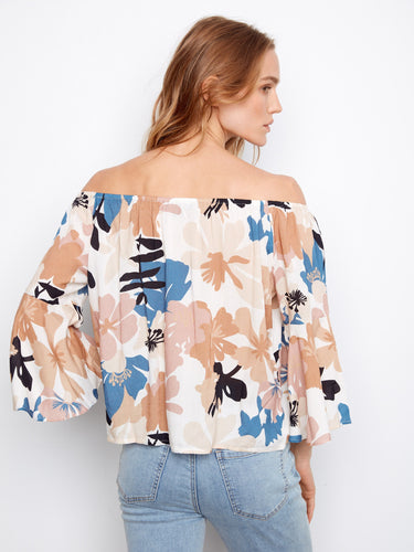 The 3/4 sleeves add a touch of elegance to this beautifully patterned, lightweight blouse by Charlie B.