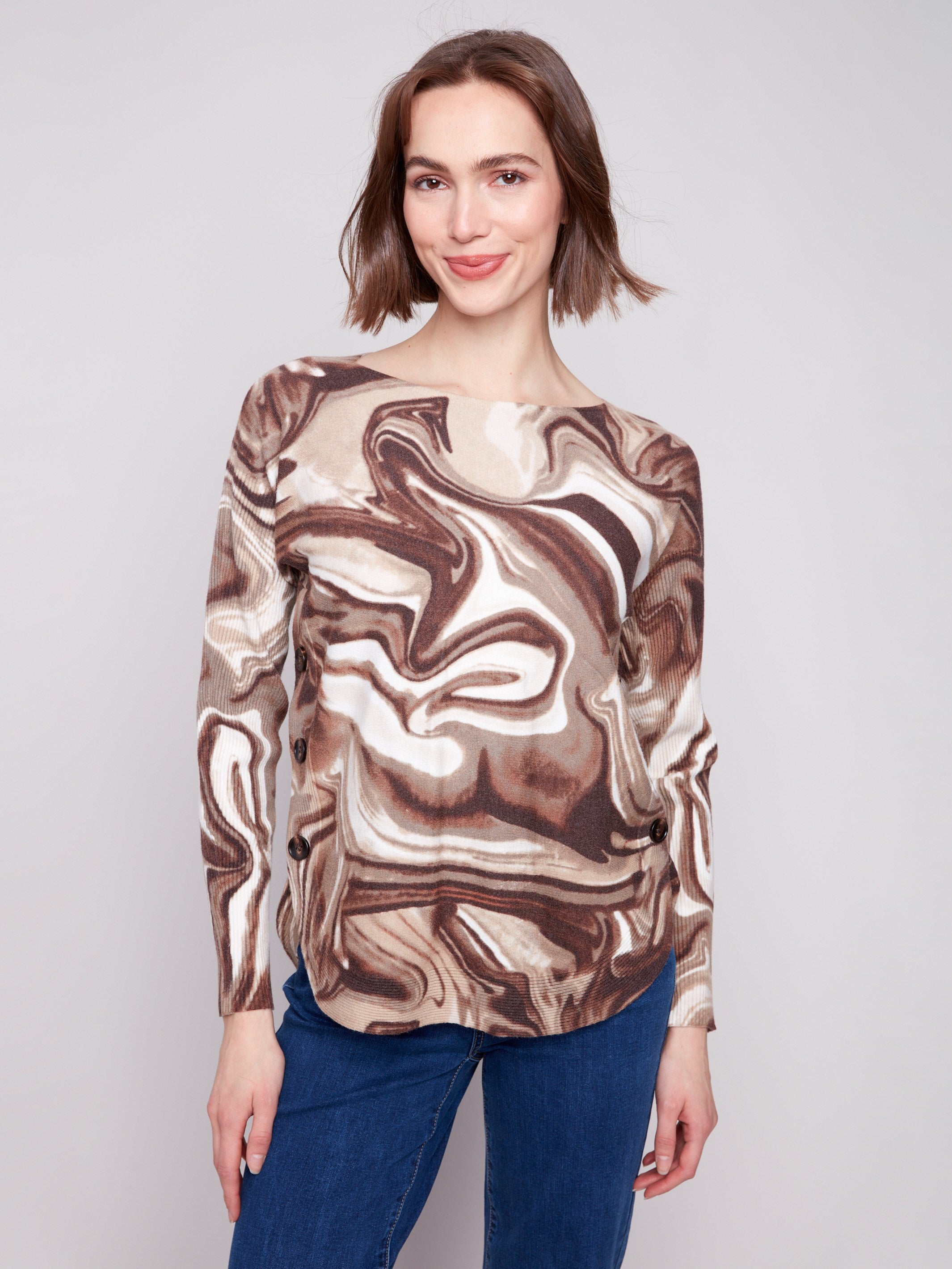 Swirl print sweater featuring a boat neck and ribbed sleeves, adding texture to the design by Charlie B.