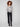 Stylish shirt collar blouse with side slits and semi-sheer fabric, offering a modern twist on classic design by Charlie B.