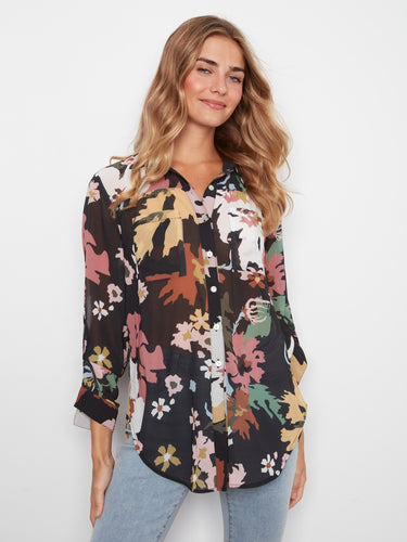 Floral print blouse featuring a classic shirt collar and button-front closure, perfect for versatile styling by Charlie B.