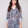 Paisley blouse featuring a semi-sheer fabric, perfect for layering and adding elegance to any outfit by Charlie B.