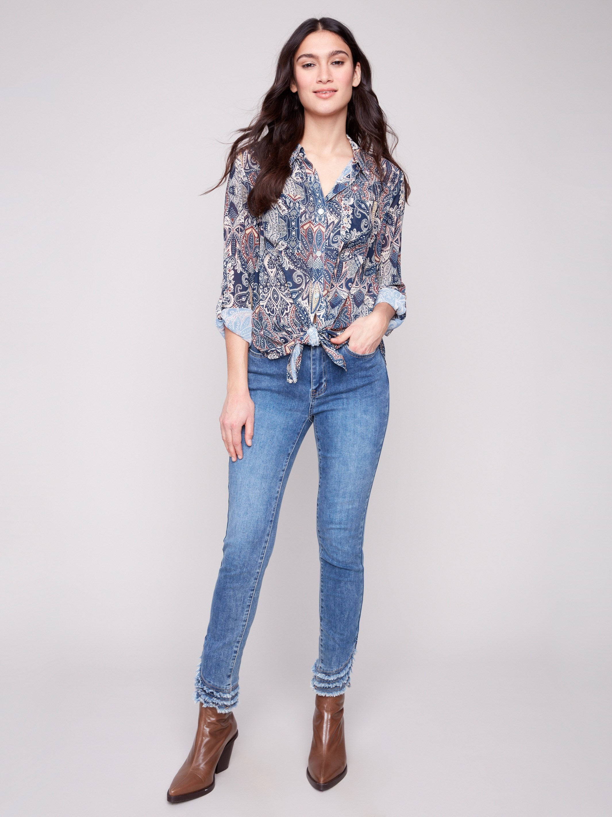 Elegant paisley blouse with chest pocket detail, combining practicality and style effortlessly by Charlie B.