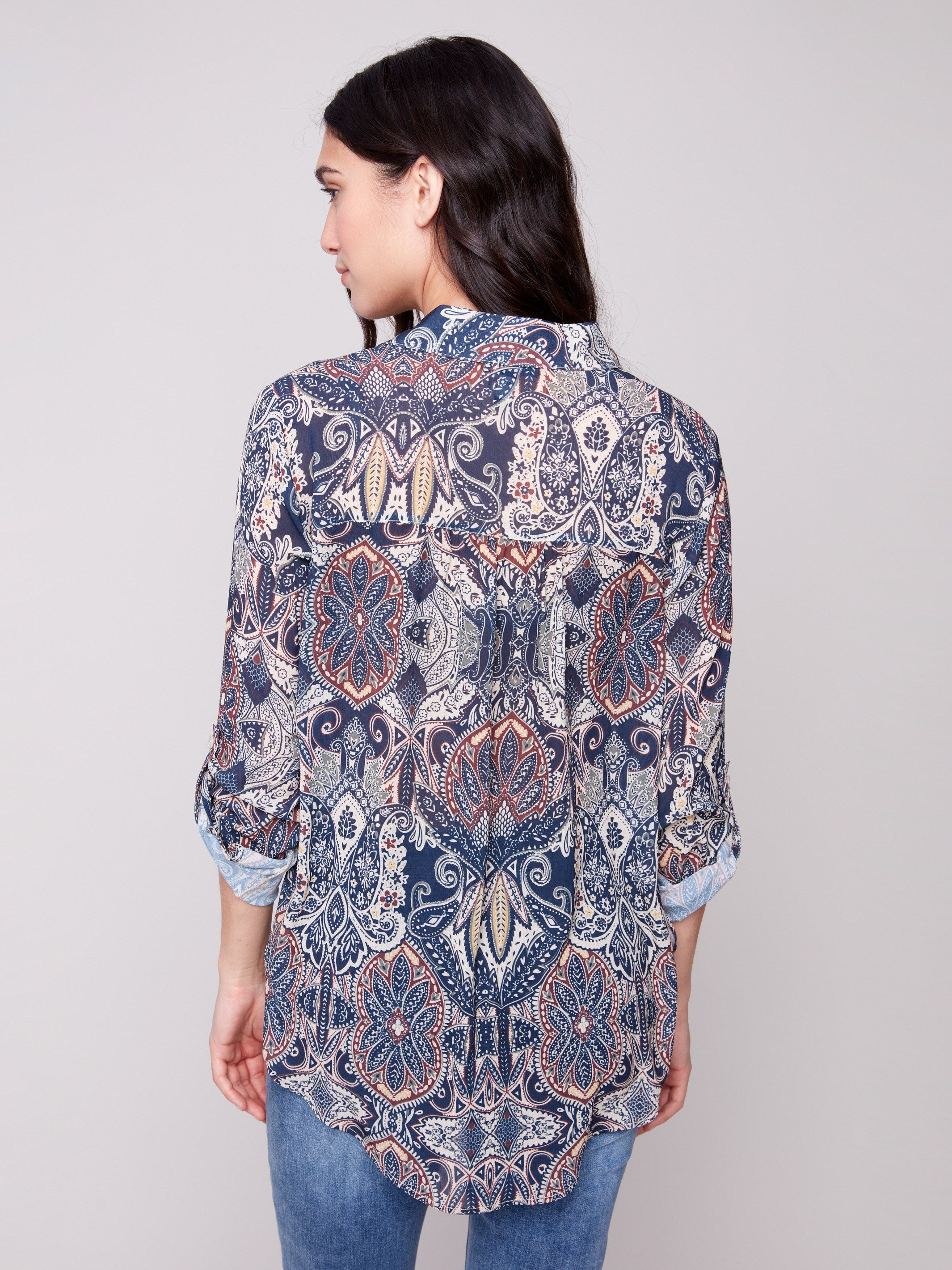 Button-down paisley blouse offering versatile wearability for casual or formal occasions by Charlie B.