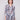 Patchwork blouse with semi-sheer fabric and adjustable roll-up sleeves for versatile styling by Charlie B.