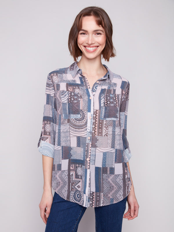 Patchwork blouse with semi-sheer fabric and adjustable roll-up sleeves for versatile styling by Charlie B.